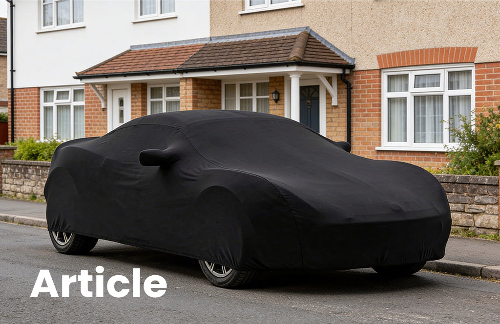 Lotus Elise outside with a indoor car cover